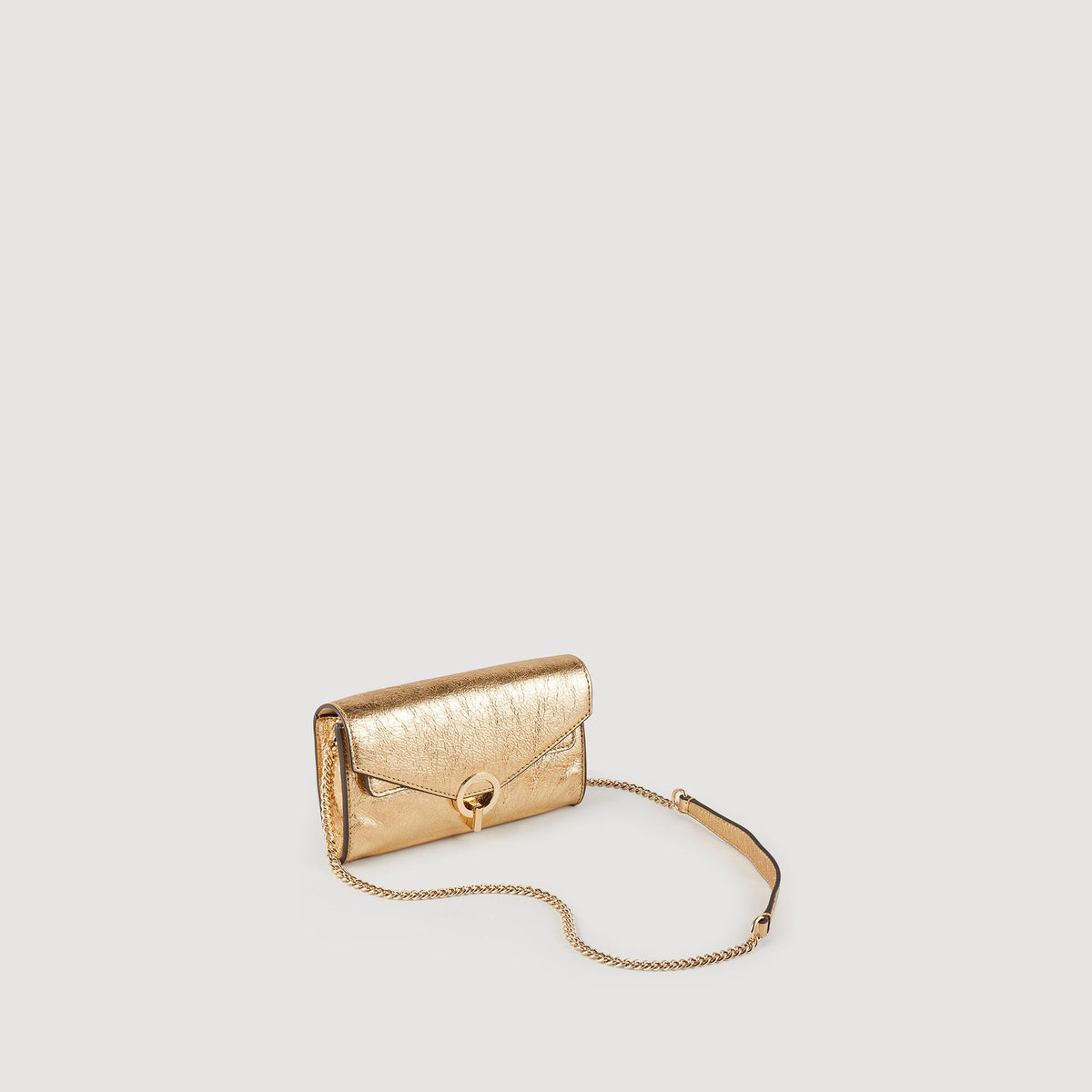 Gold leather clutch bag | Sandro