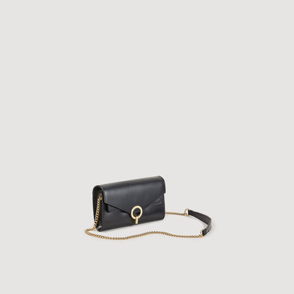 Yza Pocket clutch bag | Sandro