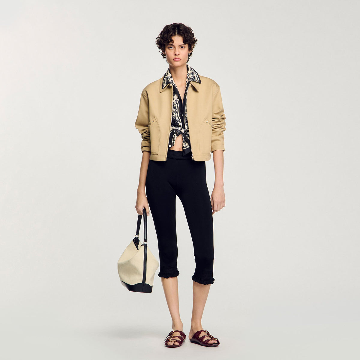 Short jacket with rhinestone details | Sandro