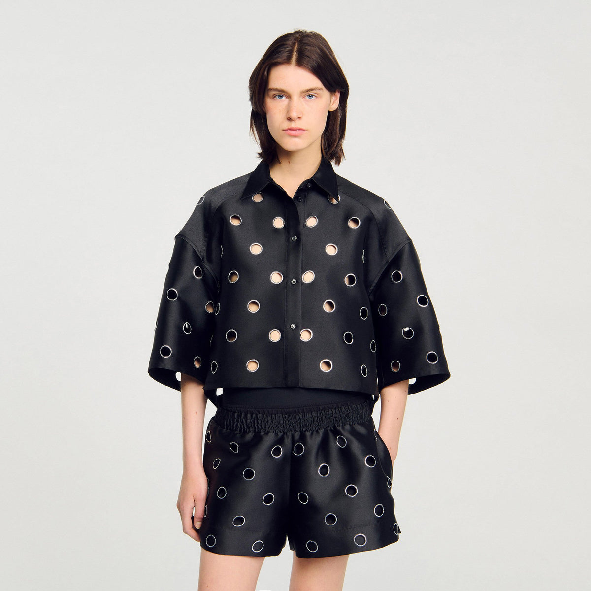 Oversized shirt with rhinestones holes | Sandro