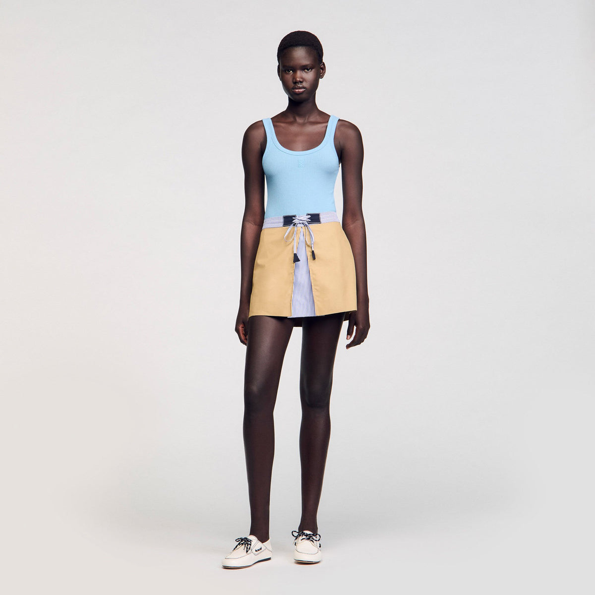 Mini dual-material skirt | Sandro