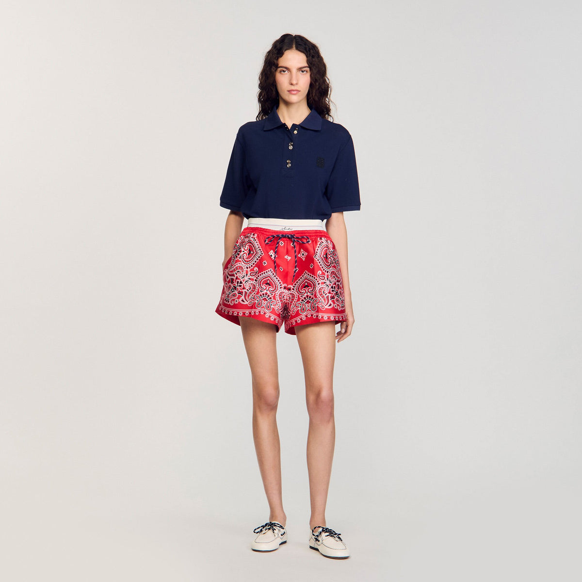 Polo shirt with decorative buttons | Sandro