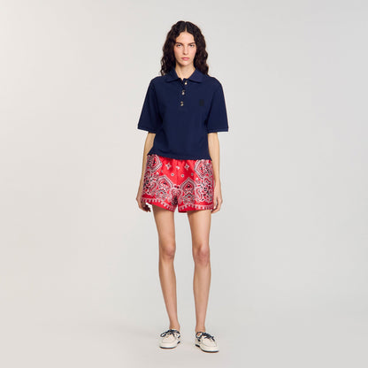 Polo shirt with decorative buttons | Sandro