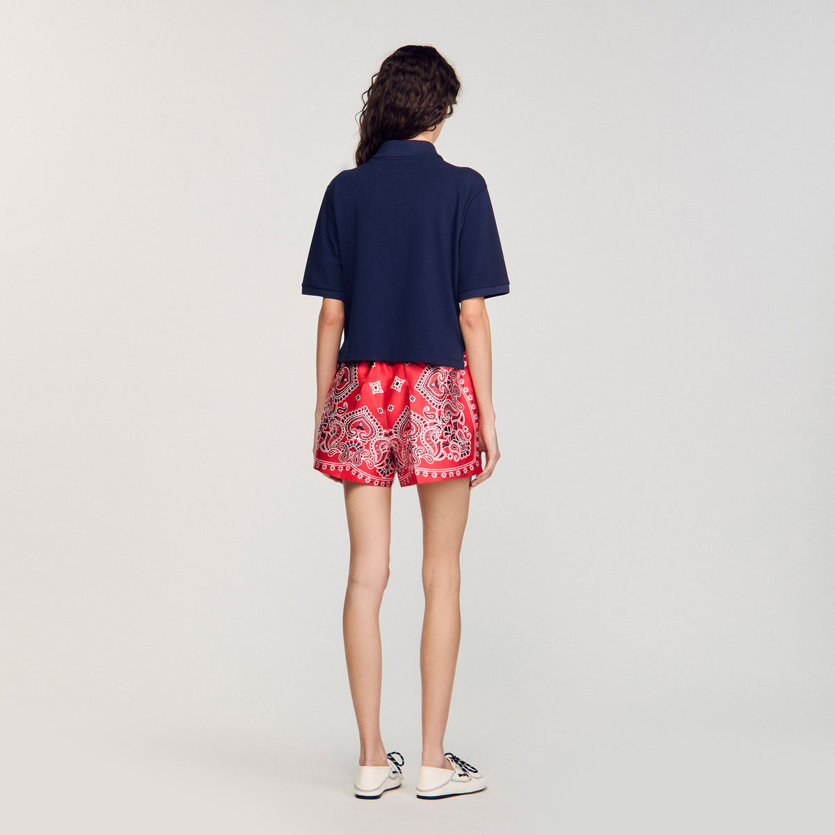 Polo shirt with decorative buttons | Sandro
