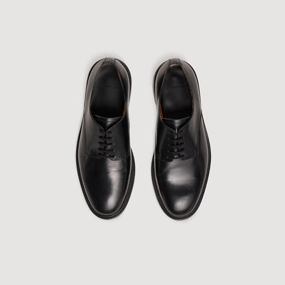 Glazed leather dress shoes | Sandro