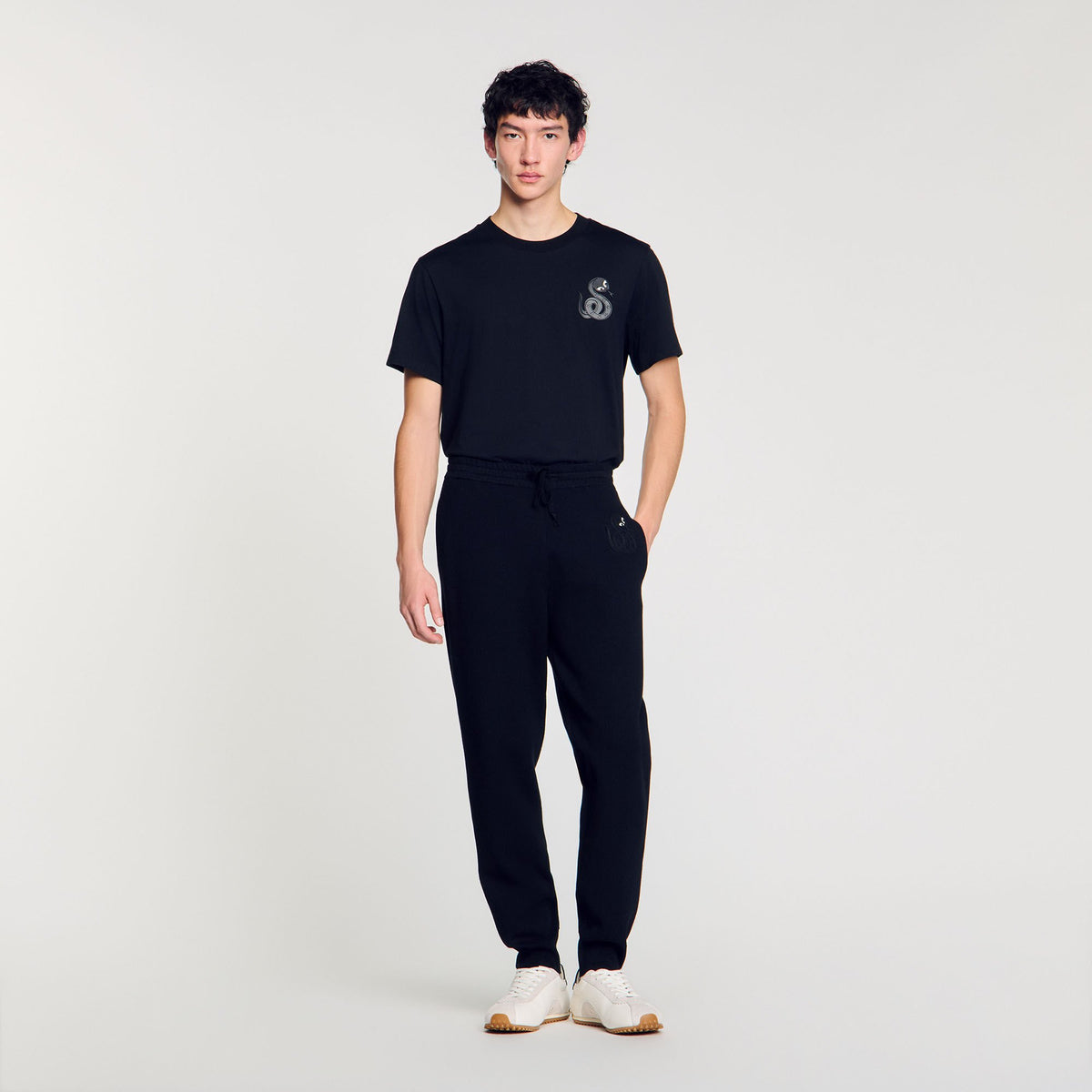 Joggers with snake detail | Sandro