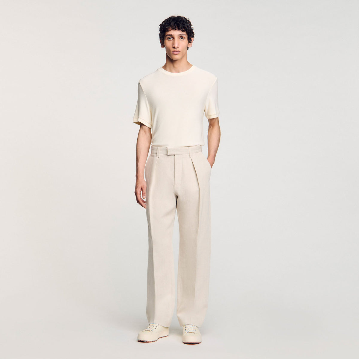 Wide-leg trousers with creases | Sandro