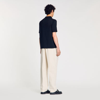 Knitted polo shirt with zip collar | Sandro