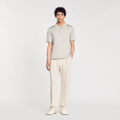 Knitted polo shirt with zip collar | Sandro