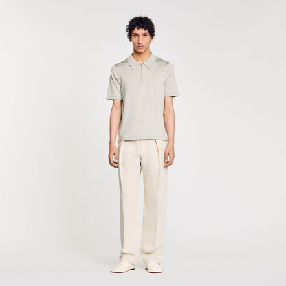 Knitted polo shirt with zip collar | Sandro