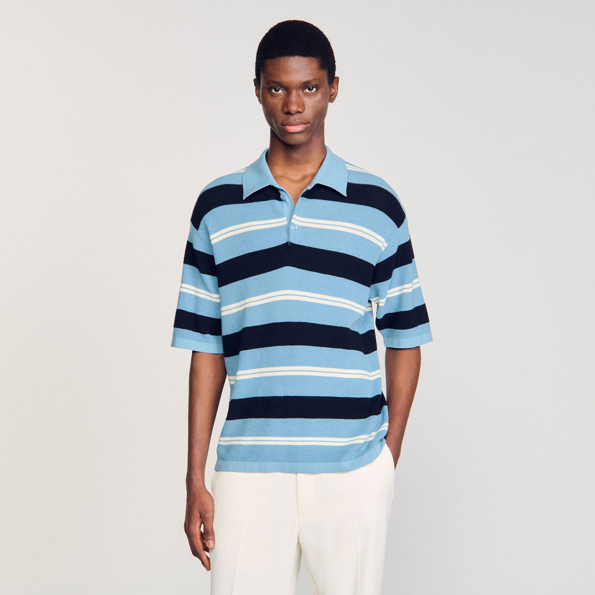 Striped knit polo shirt | Sandro