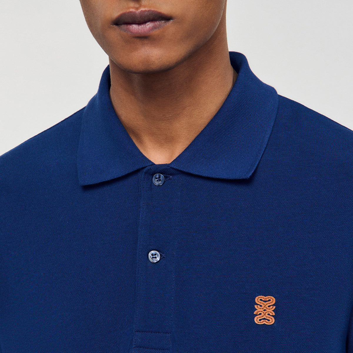Polo shirt with leather logo | Sandro