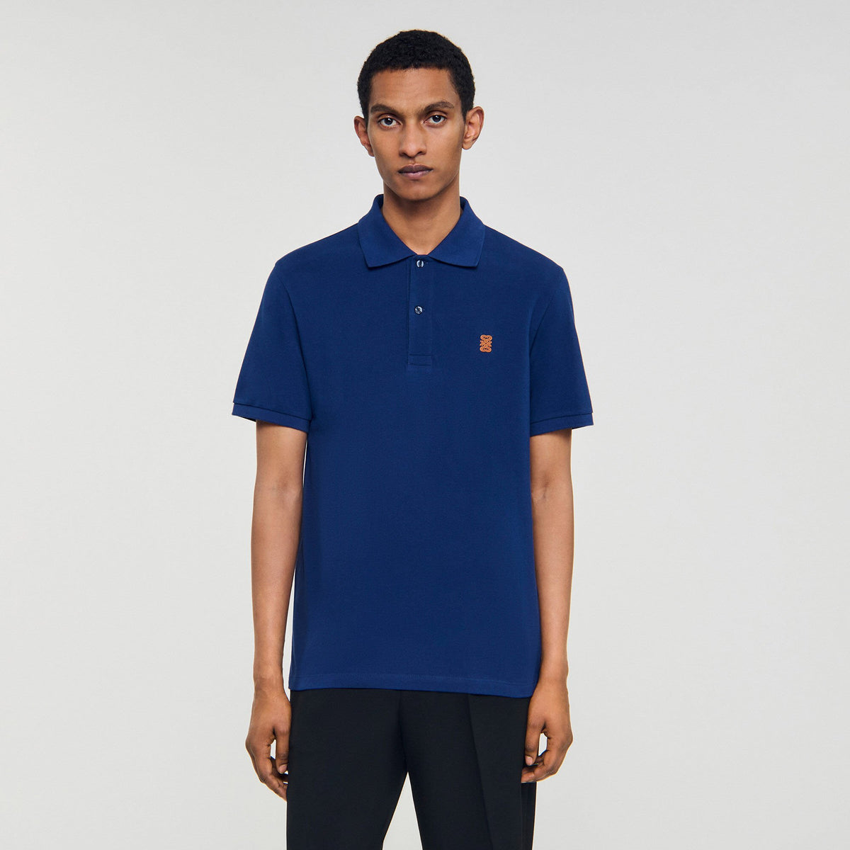 Polo shirt with leather logo | Sandro